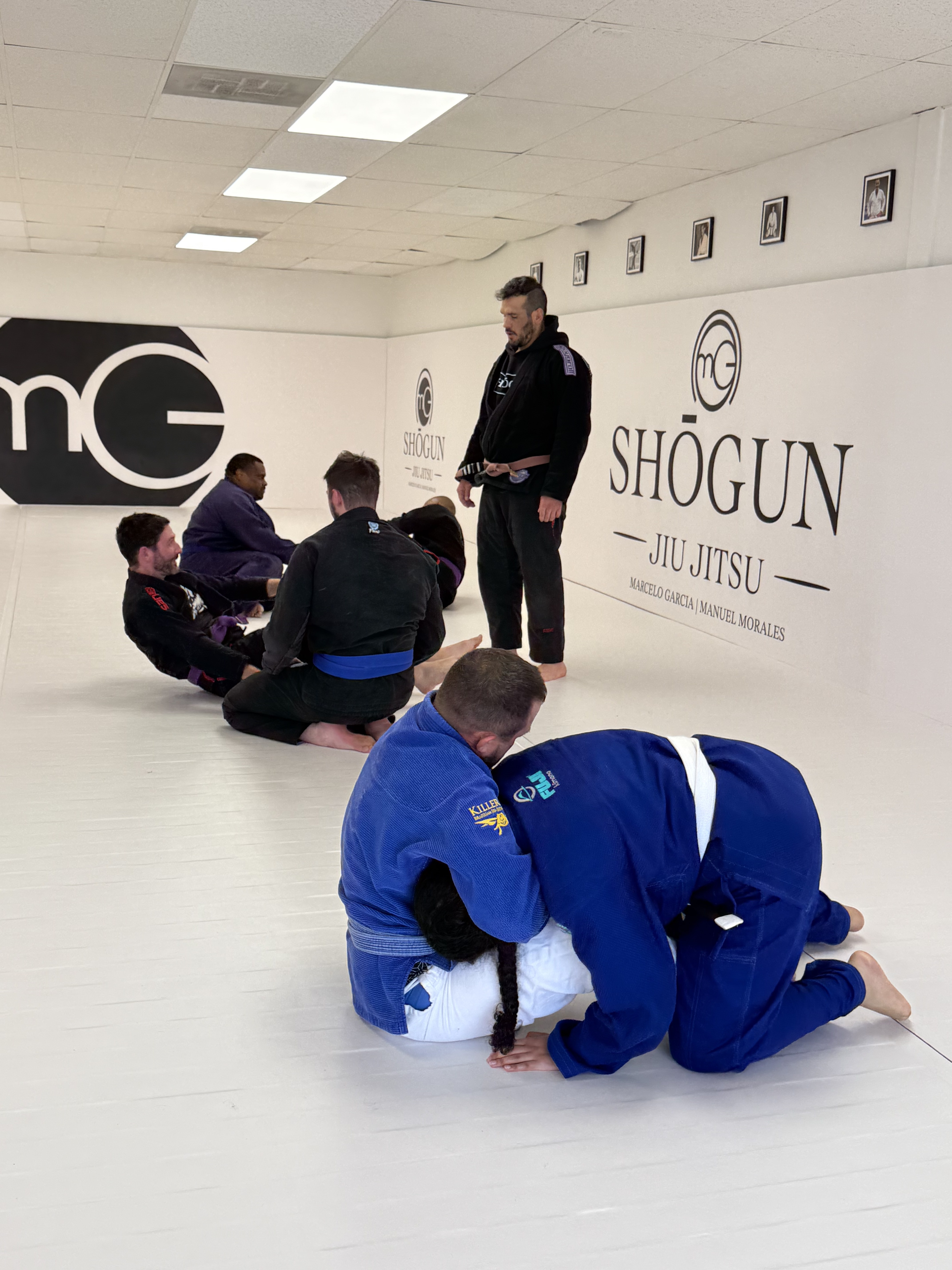 Partners rolling during a Shōgun class